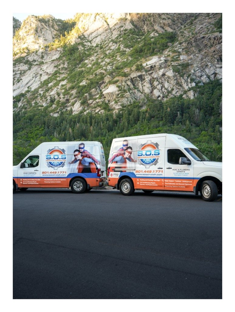 S.O.S Plumbing, Heating, & Cooling service vans on the Wasatch Front